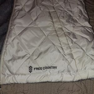 White Free Country light weight reversible vest. X
